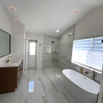 bathroom remodel with deep oval tub
